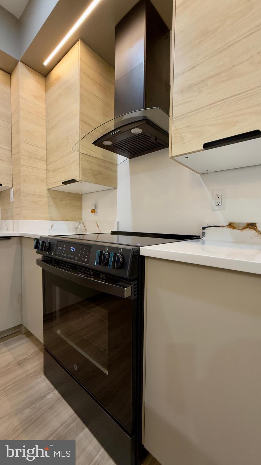 1011 Elnore Avenue Temple, PA 19560 - Photo 13 of 61 a close view of stove top oven