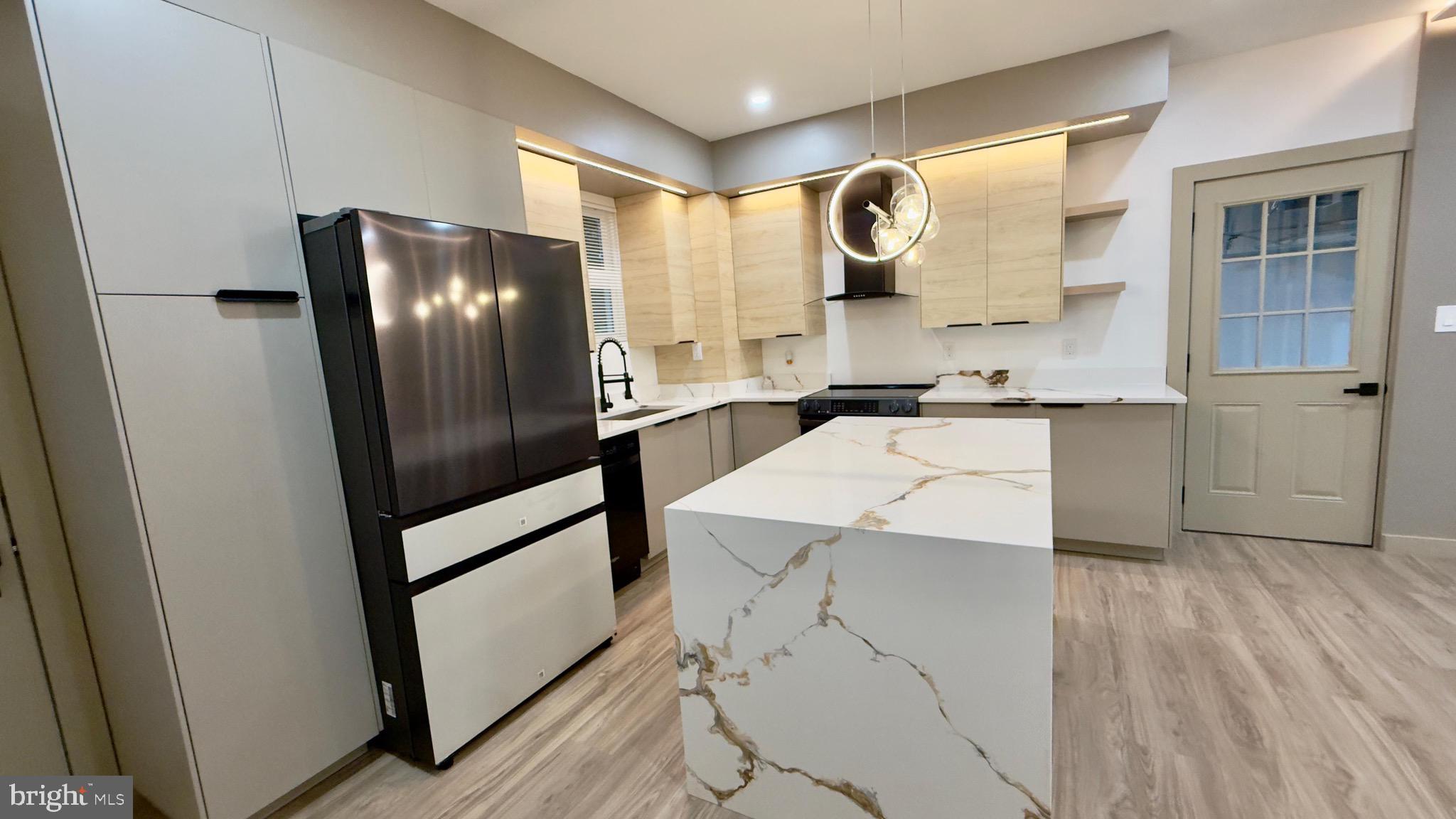 1011 Elnore Avenue Temple, PA 19560 - Photo 2 of 61 a bathroom with a sink a mirror and a shower