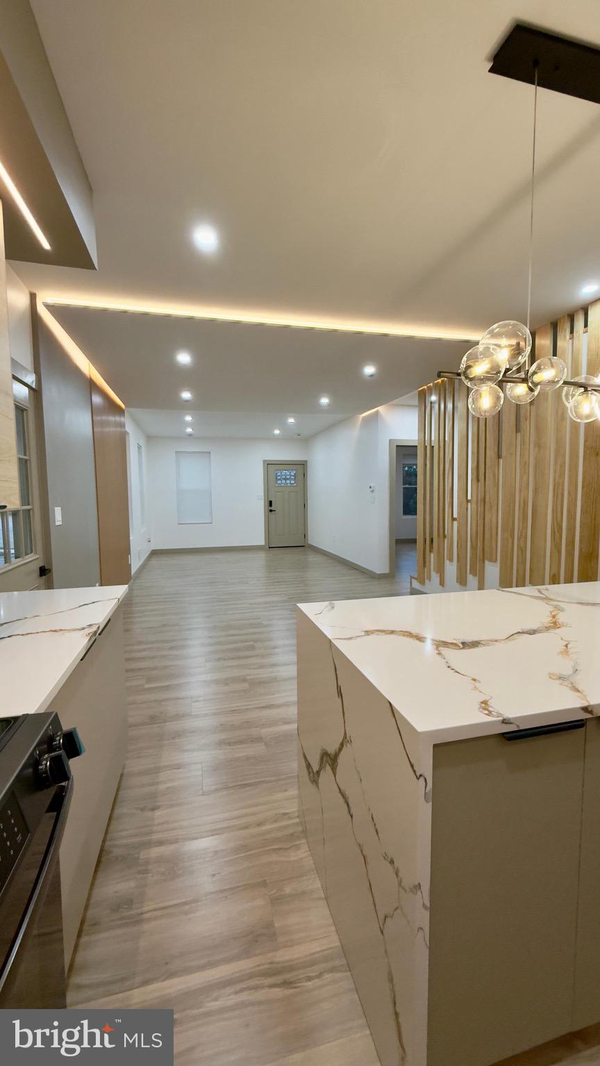 1011 Elnore Avenue Temple, PA 19560 - Photo 25 of 61 a view of a kitchen with a sink and a refrigerator