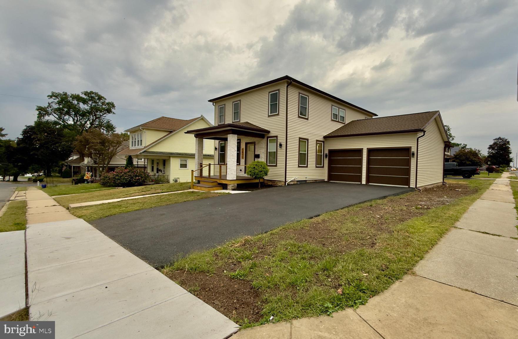 1011 Elnore Avenue Temple, PA 19560 - Photo 4 of 61 a front view of a house with a yard