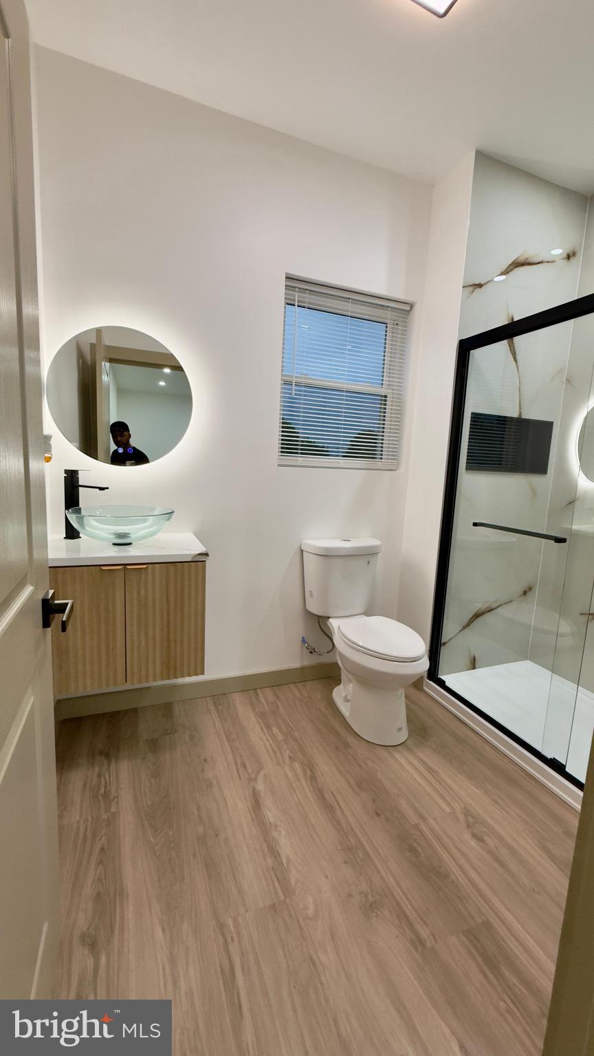 1011 Elnore Avenue Temple, PA 19560 - Photo 45 of 61 a bathroom with a toilet and a mirror