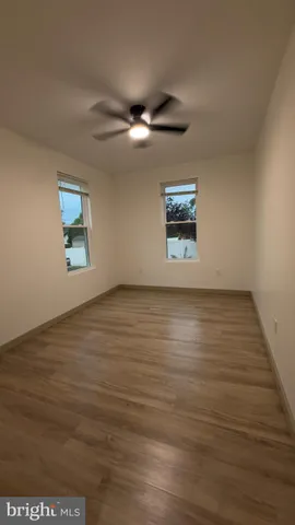 a view of room with a flat screen tv