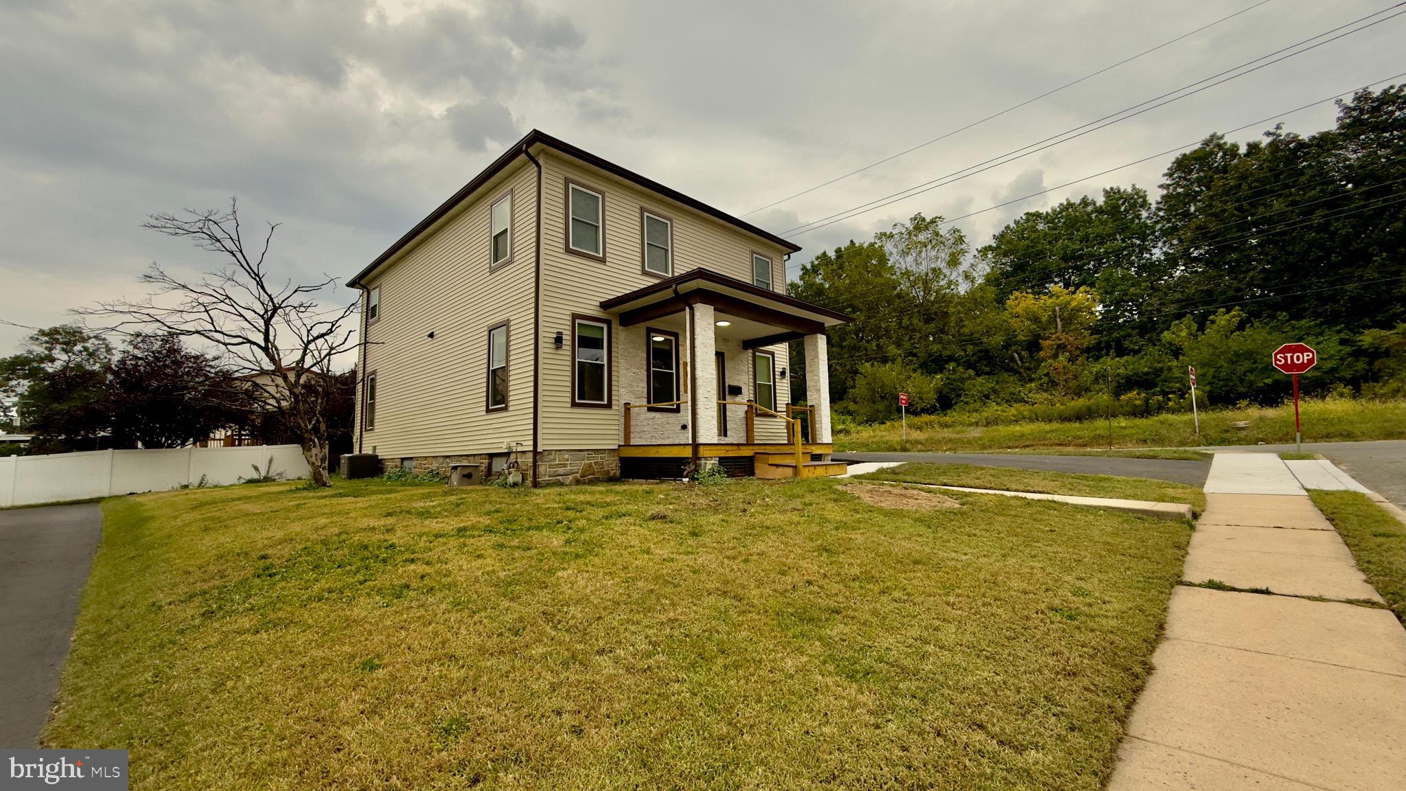 1011 Elnore Avenue Temple, PA 19560 - Photo 58 of 61 a front view of house with yard and trees around
