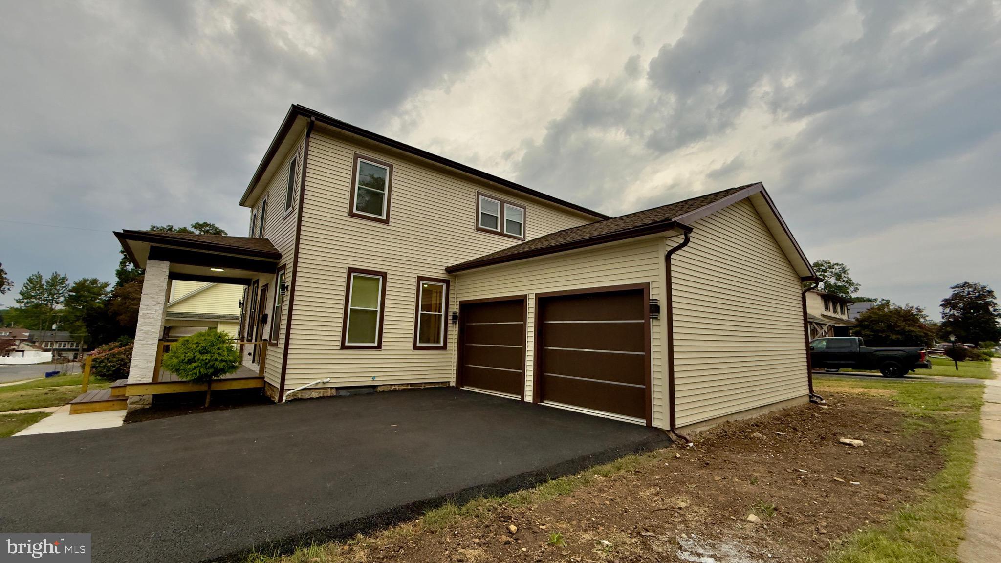 1011 Elnore Avenue Temple, PA 19560 - Photo 60 of 61 a front view of a house with a yard