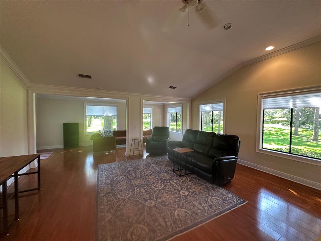 104 Woden Way Winter Haven, FL 33884 - Photo 13 of 48 a living room with furniture and a window