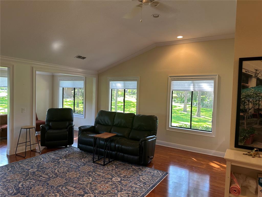 104 Woden Way Winter Haven, FL 33884 - Photo 14 of 48 a living room with furniture and a window