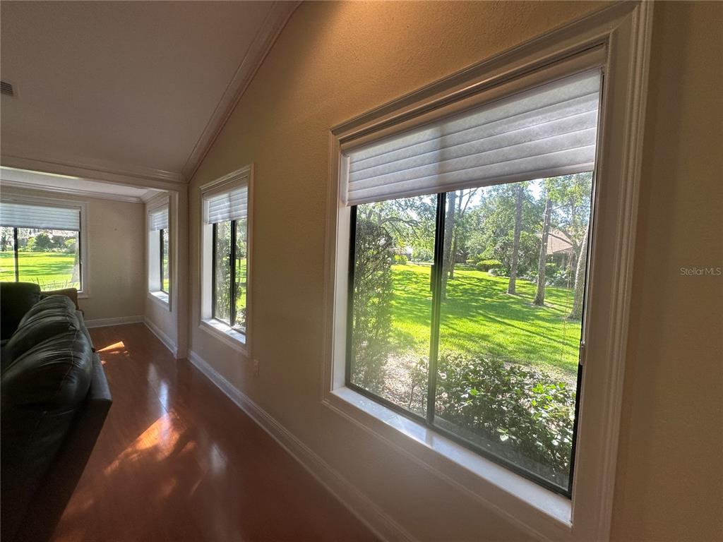104 Woden Way Winter Haven, FL 33884 - Photo 8 of 48 a bed room with a bed and a large window