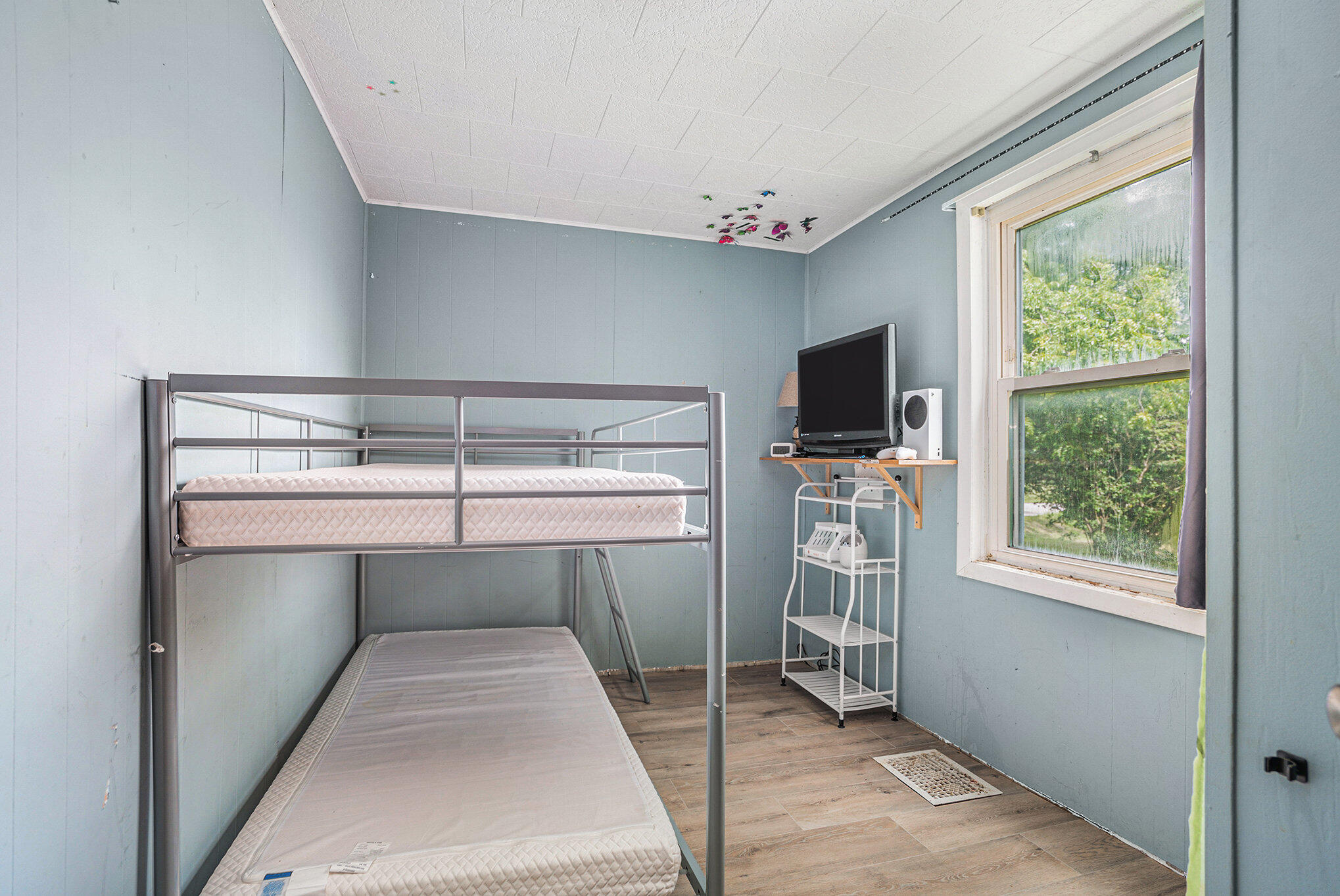 2980 18 Mile Road Northeast Cedar Springs, MI 49319 - Photo 15 of 26 Main level bedroom 2