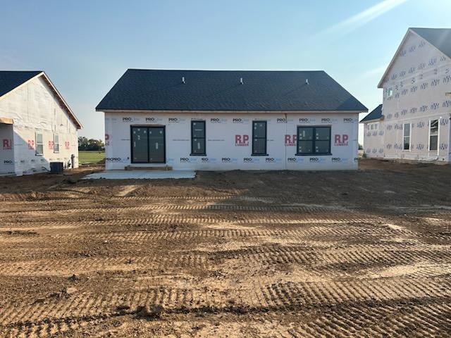 667 South Regulators Street Rochelle, IL 61068 - Photo 2 of 4 a front view of a house with a yard