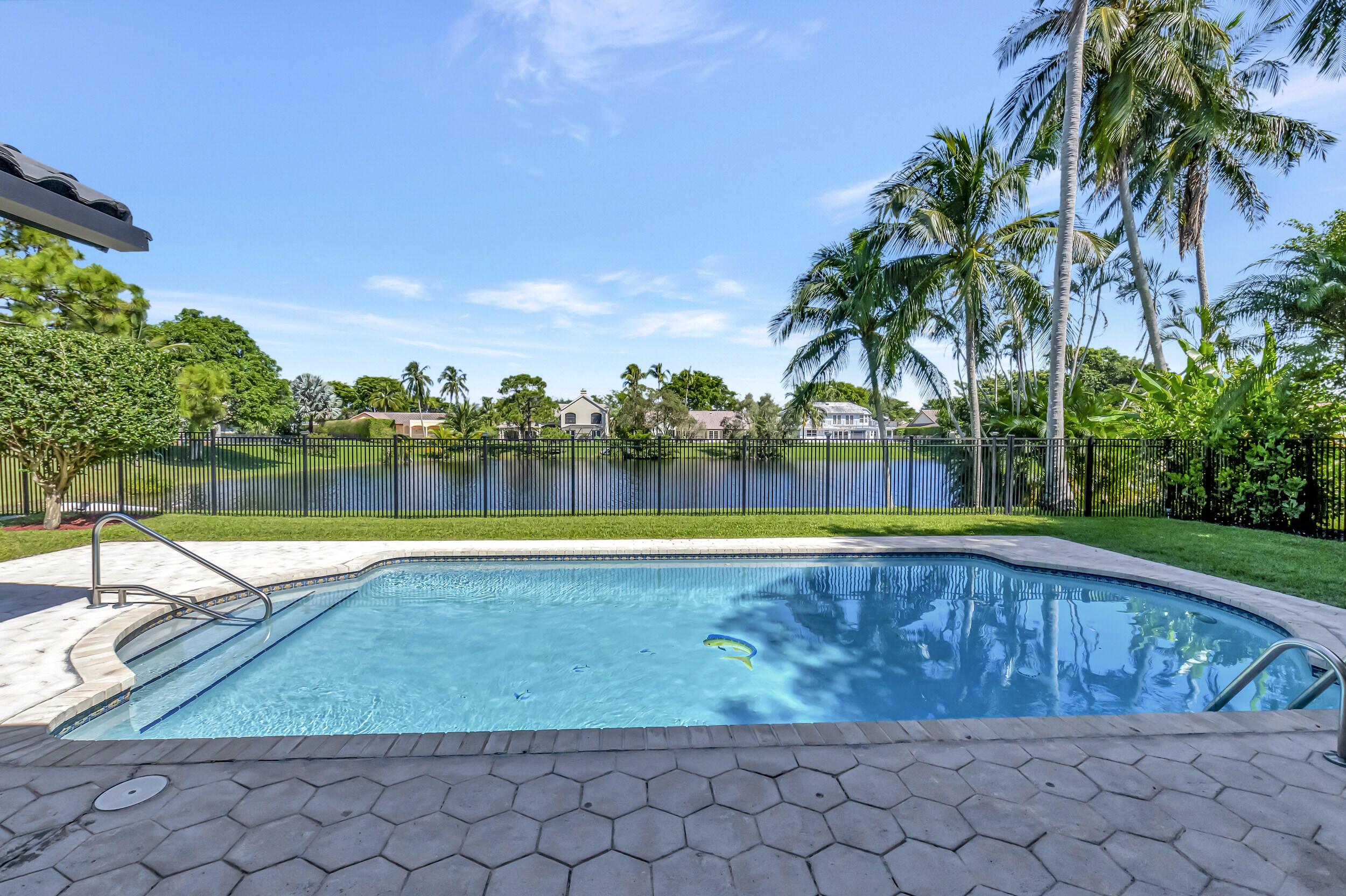2677 Northwest 46th Street Boca Raton, FL 33434 - Photo 42 of 52 POOL/LAKE VIEW IN BACKYARD