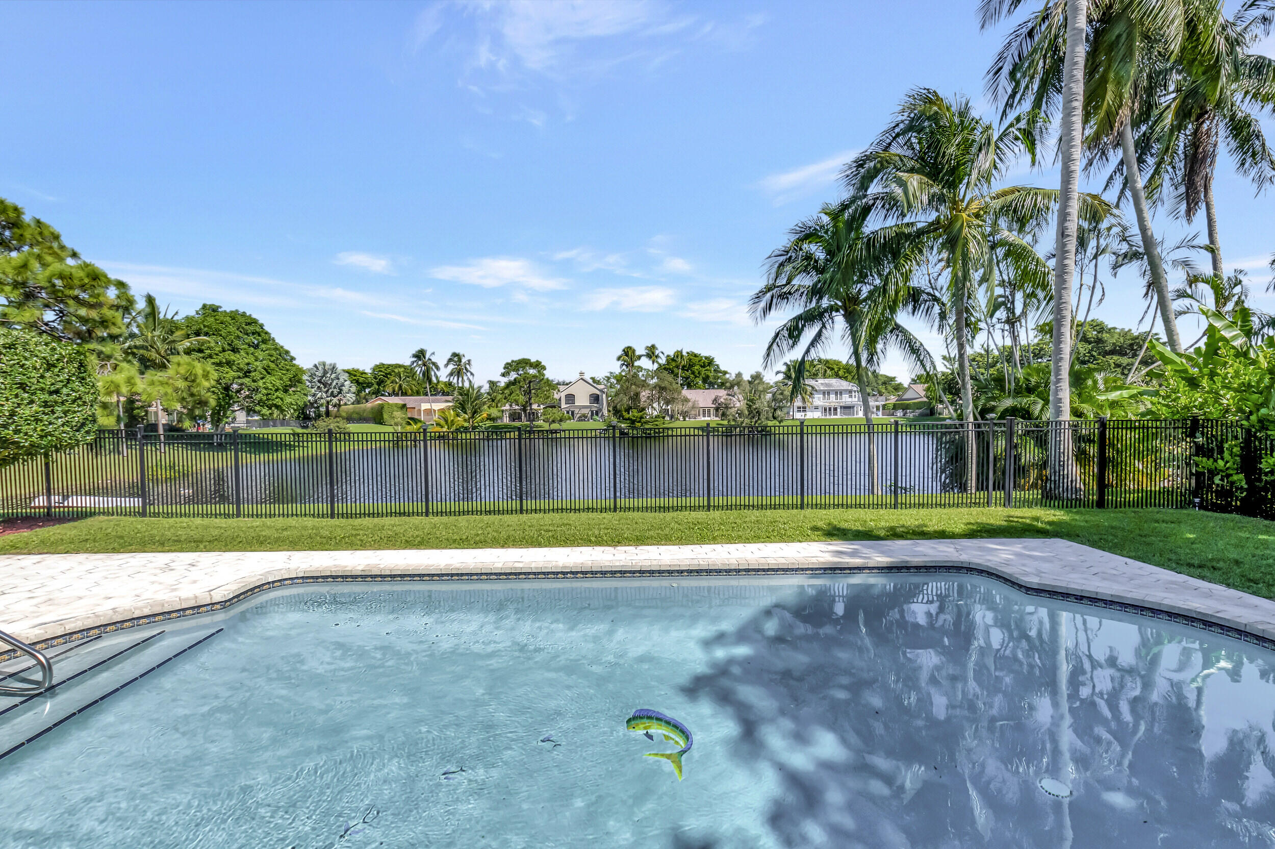 2677 Northwest 46th Street Boca Raton, FL 33434 - Photo 43 of 52 POOL/LAKE VIEW IN BACKYARD
