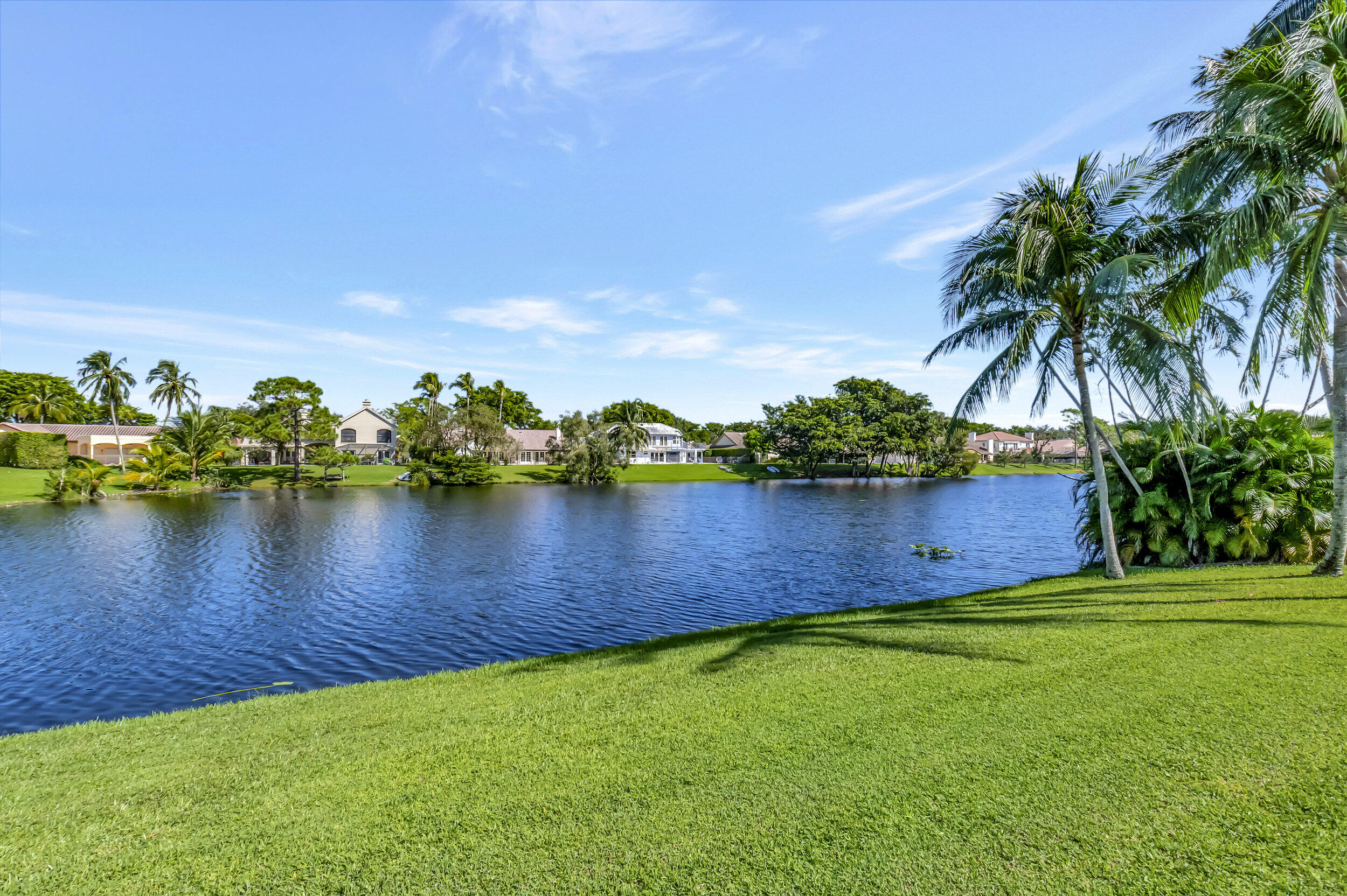 2677 Northwest 46th Street Boca Raton, FL 33434 - Photo 47 of 52 LAKE VIEW IN BACKYARD