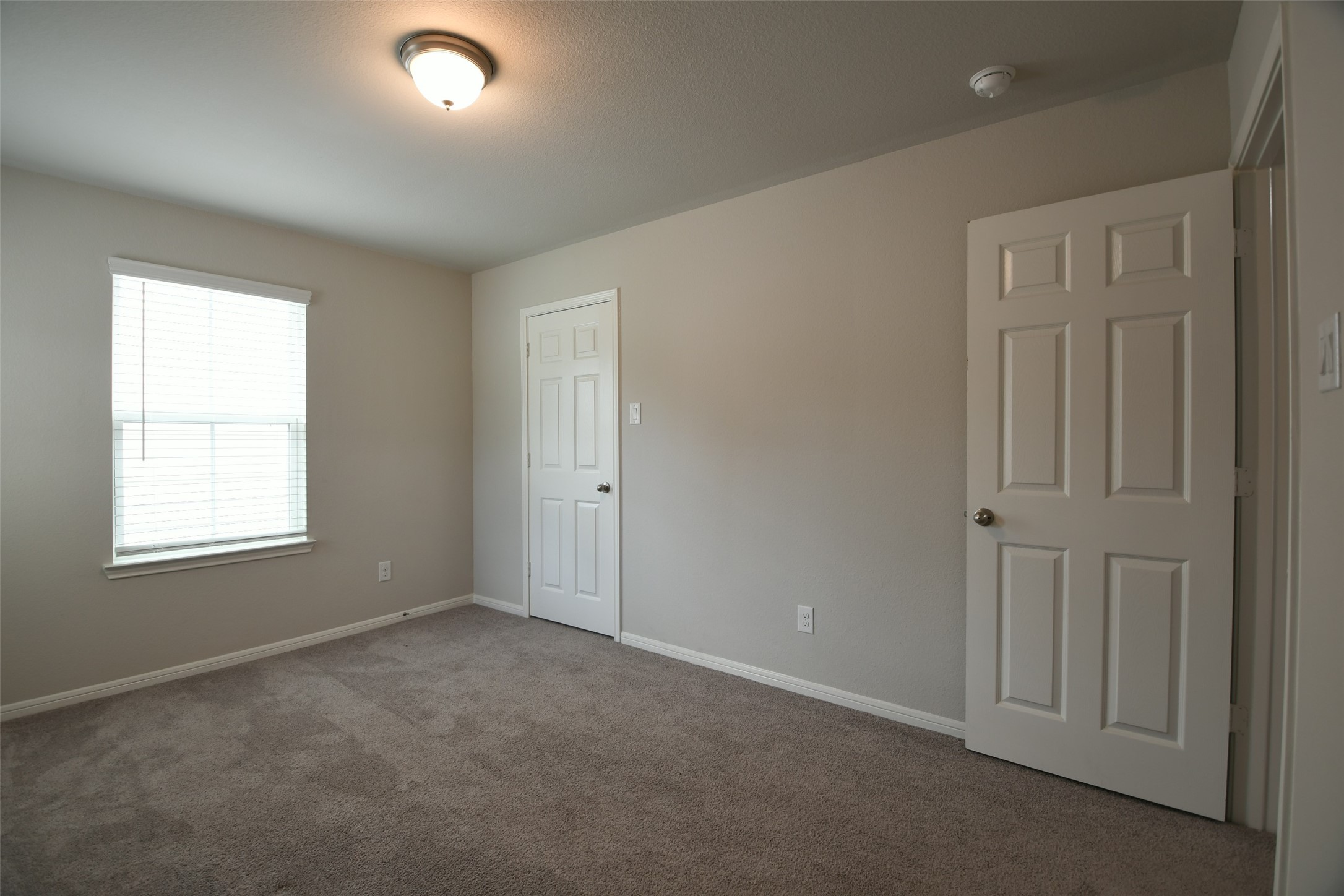 104 Camelot Pl Court Conroe, TX 77304 - Photo 25 of 34 an empty room with a window