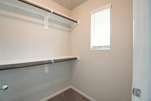 a view of a room with racks on the wall