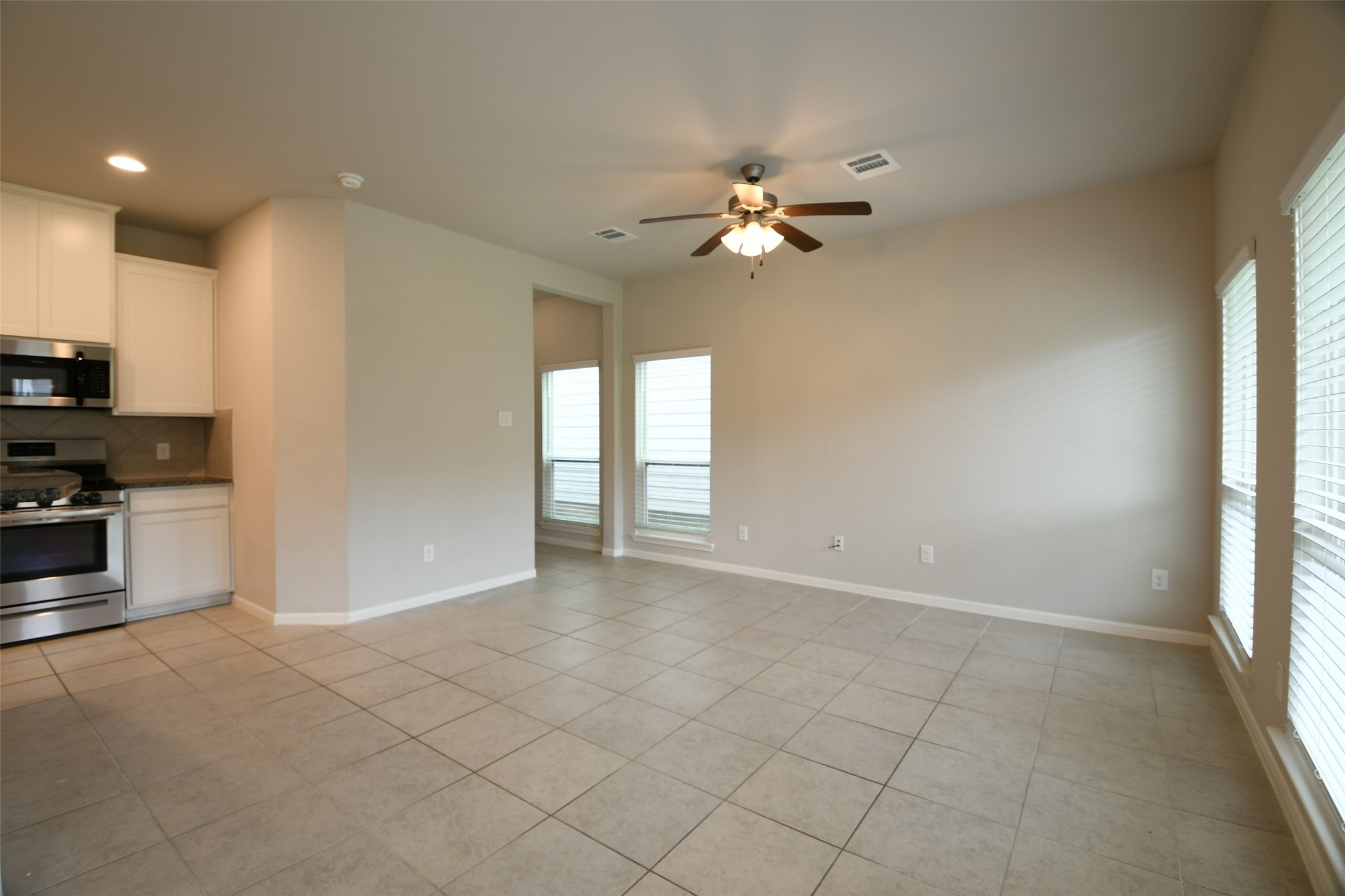 104 Camelot Pl Court Conroe, TX 77304 - Photo 7 of 34 a view of an empty room with a window