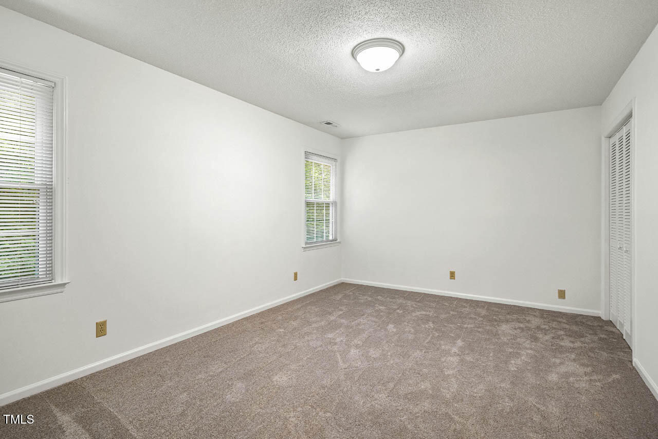 2330 Thunder Road Durham, NC 27712 - Photo 25 of 44 an empty room with windows