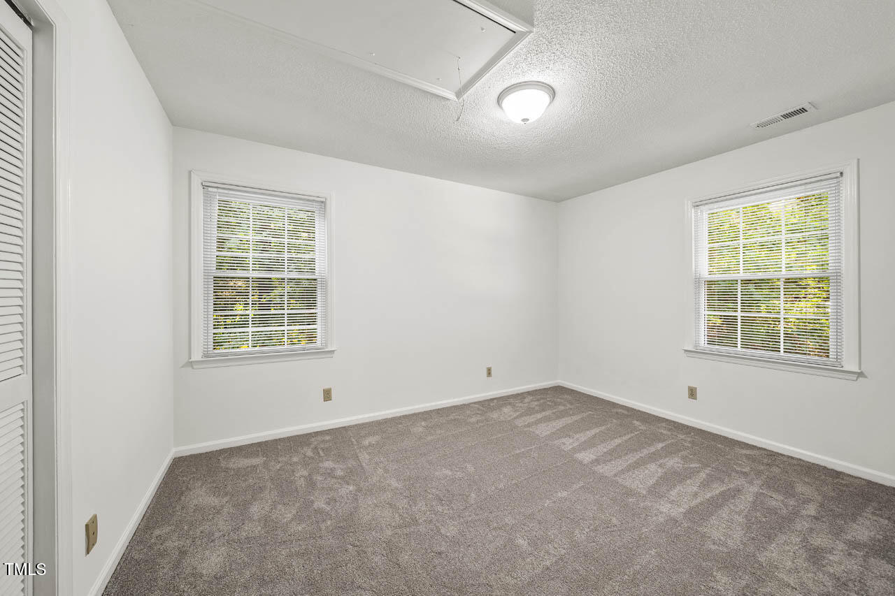 2330 Thunder Road Durham, NC 27712 - Photo 27 of 44 an empty room with a window
