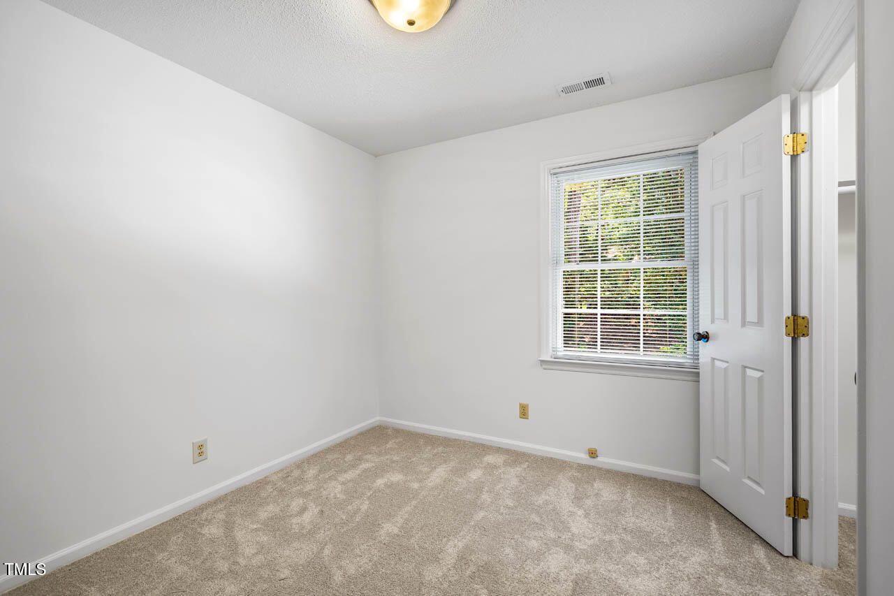 2330 Thunder Road Durham, NC 27712 - Photo 28 of 44 an empty room with a window