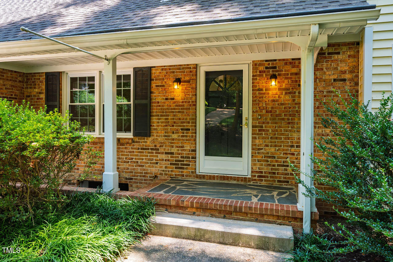 2330 Thunder Road Durham, NC 27712 - Photo 4 of 44 a view of brick house with a large window