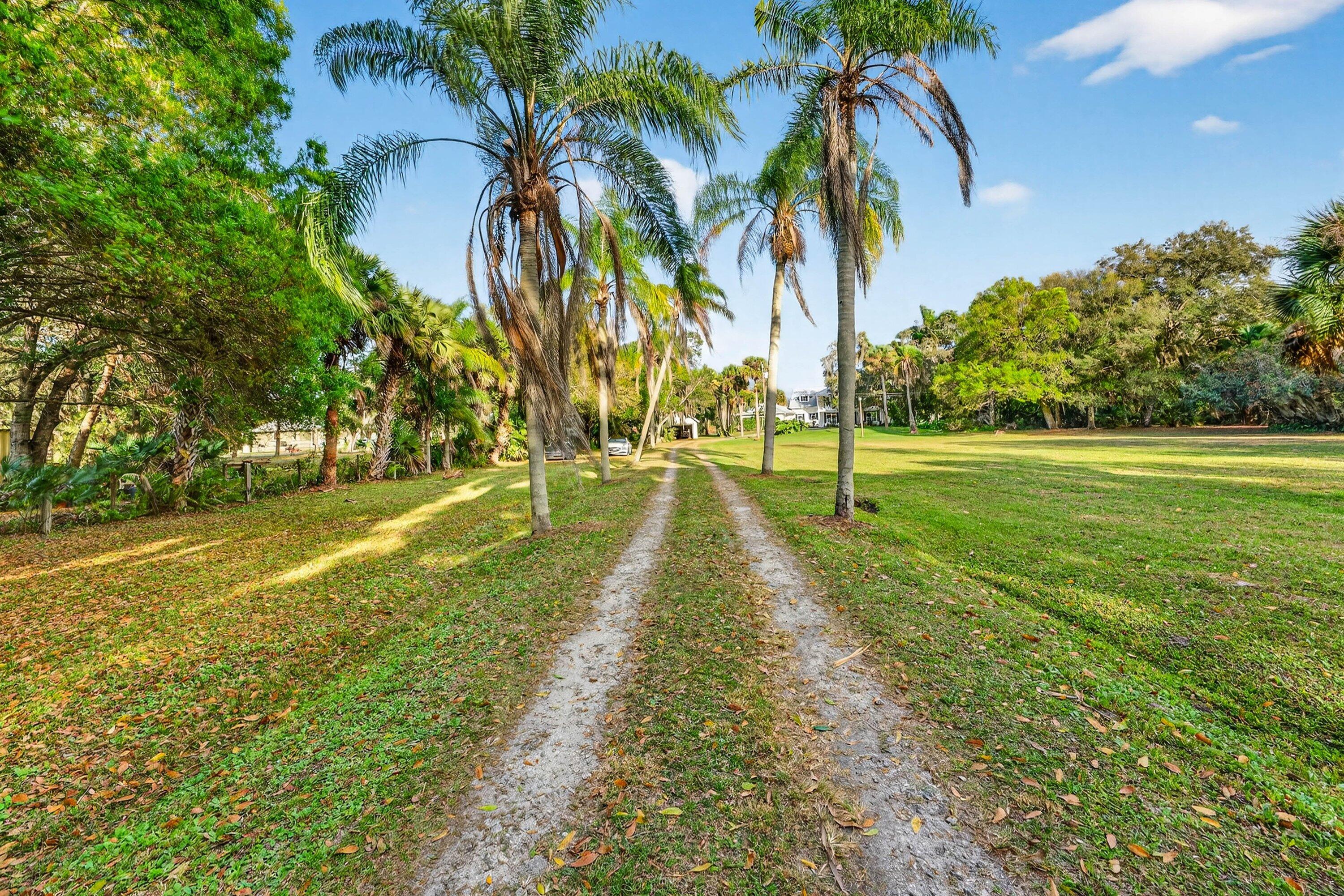 5855 Southwest Mapp Road Palm City, FL 34990 - Photo 2 of 60 01Day-Driveway1