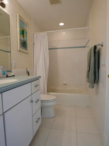 a view of a balcony with an ocean