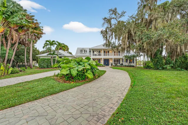 a view of multiple houses with a yard
