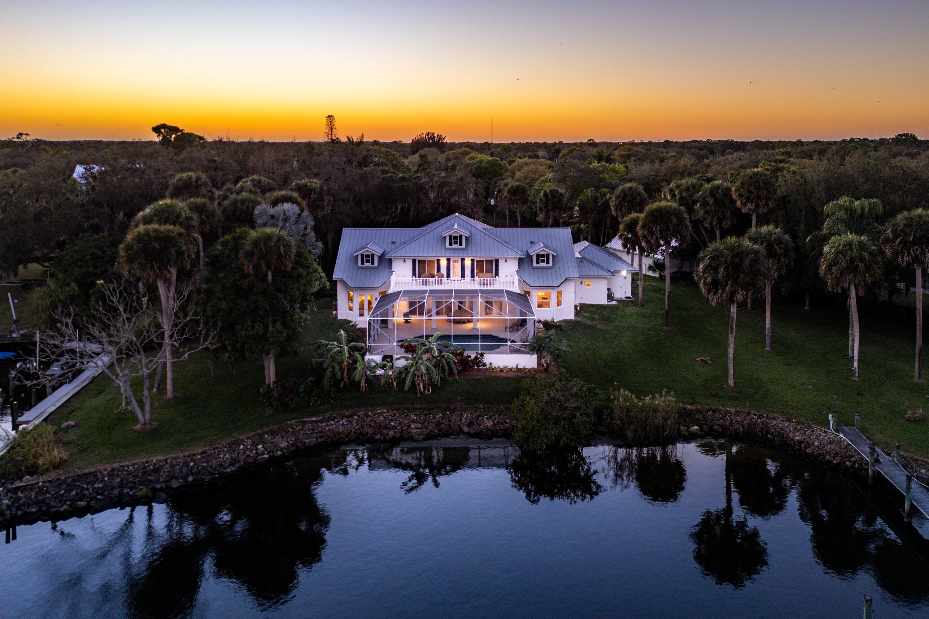 5855 Southwest Mapp Road Palm City, FL 34990 - Photo 47 of 60 47Night-HouseWaterAriel1