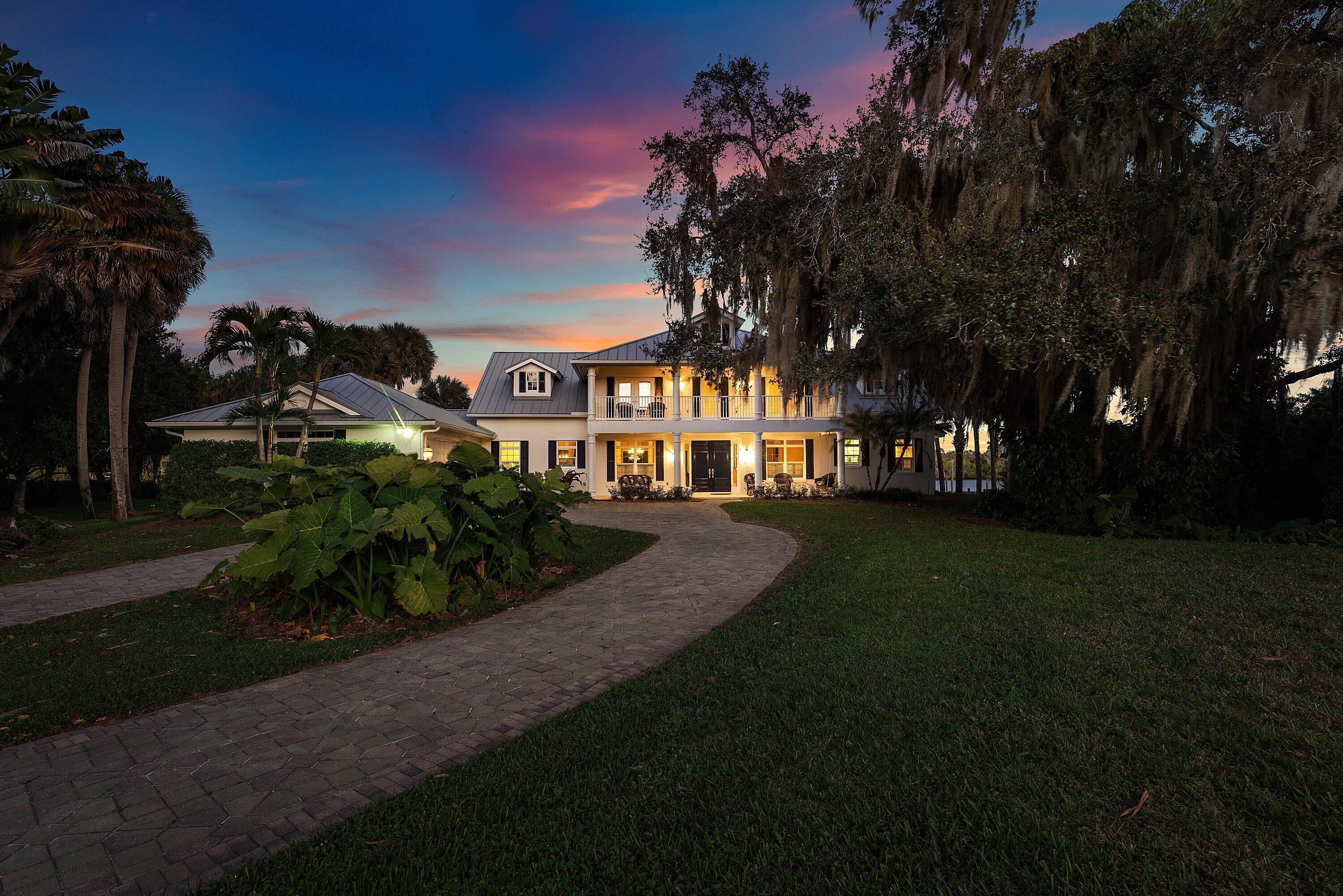 5855 Southwest Mapp Road Palm City, FL 34990 - Photo 6 of 60 05Night-FrontwGarage