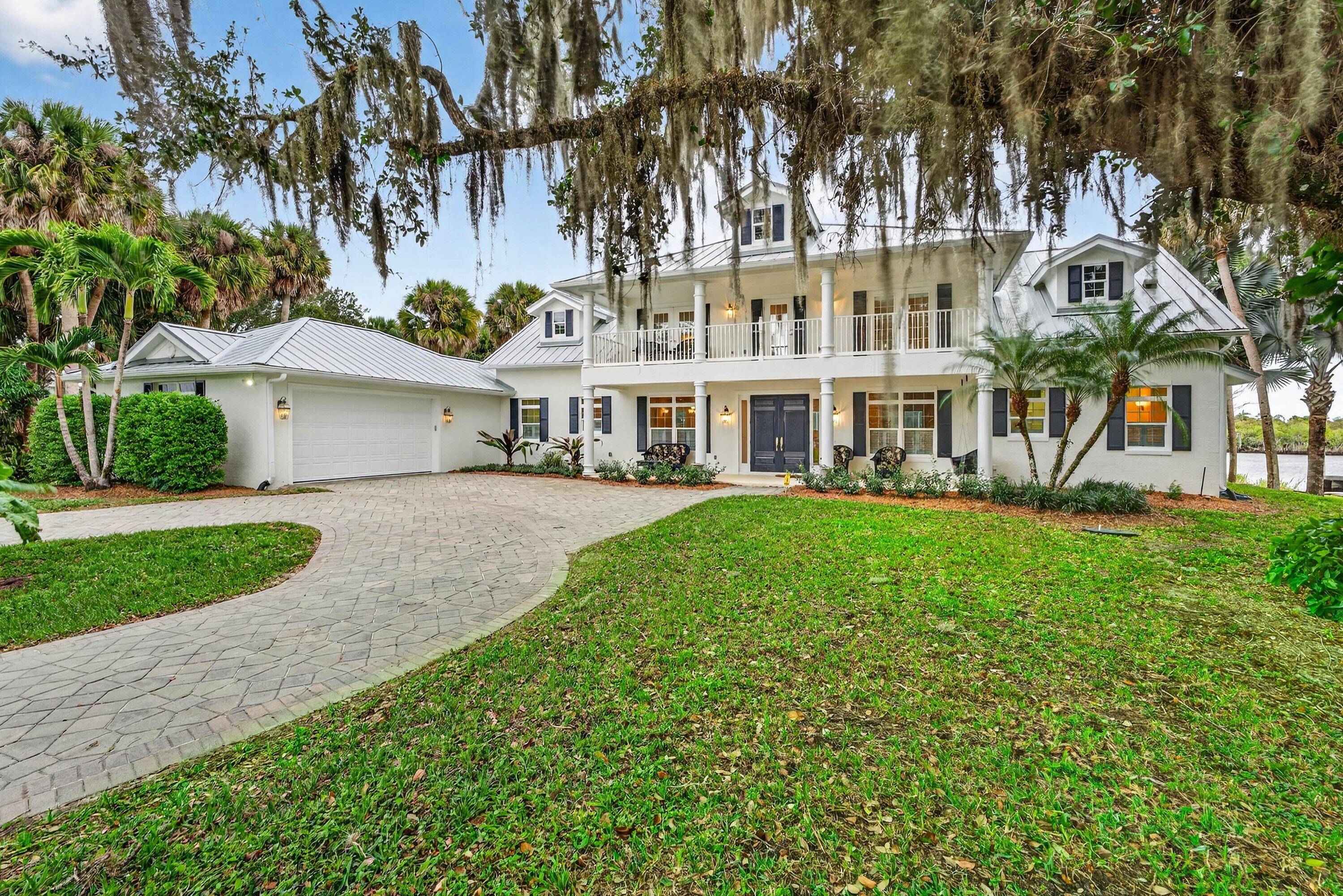 5855 Southwest Mapp Road Palm City, FL 34990 - Photo 7 of 60 06Day-FrontwGarage