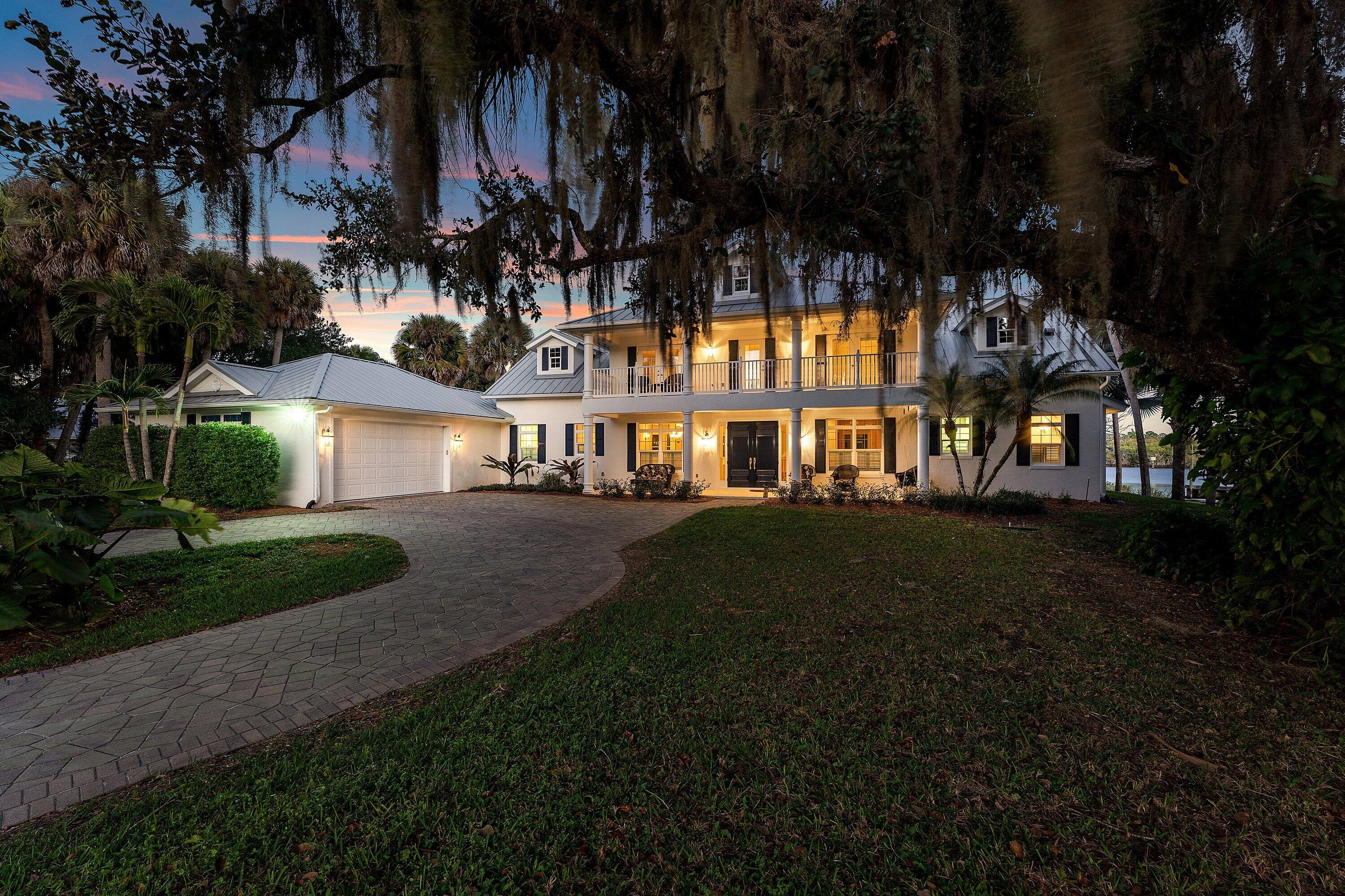 5855 Southwest Mapp Road Palm City, FL 34990 - Photo 8 of 60 07Night-FrontwGarageClose