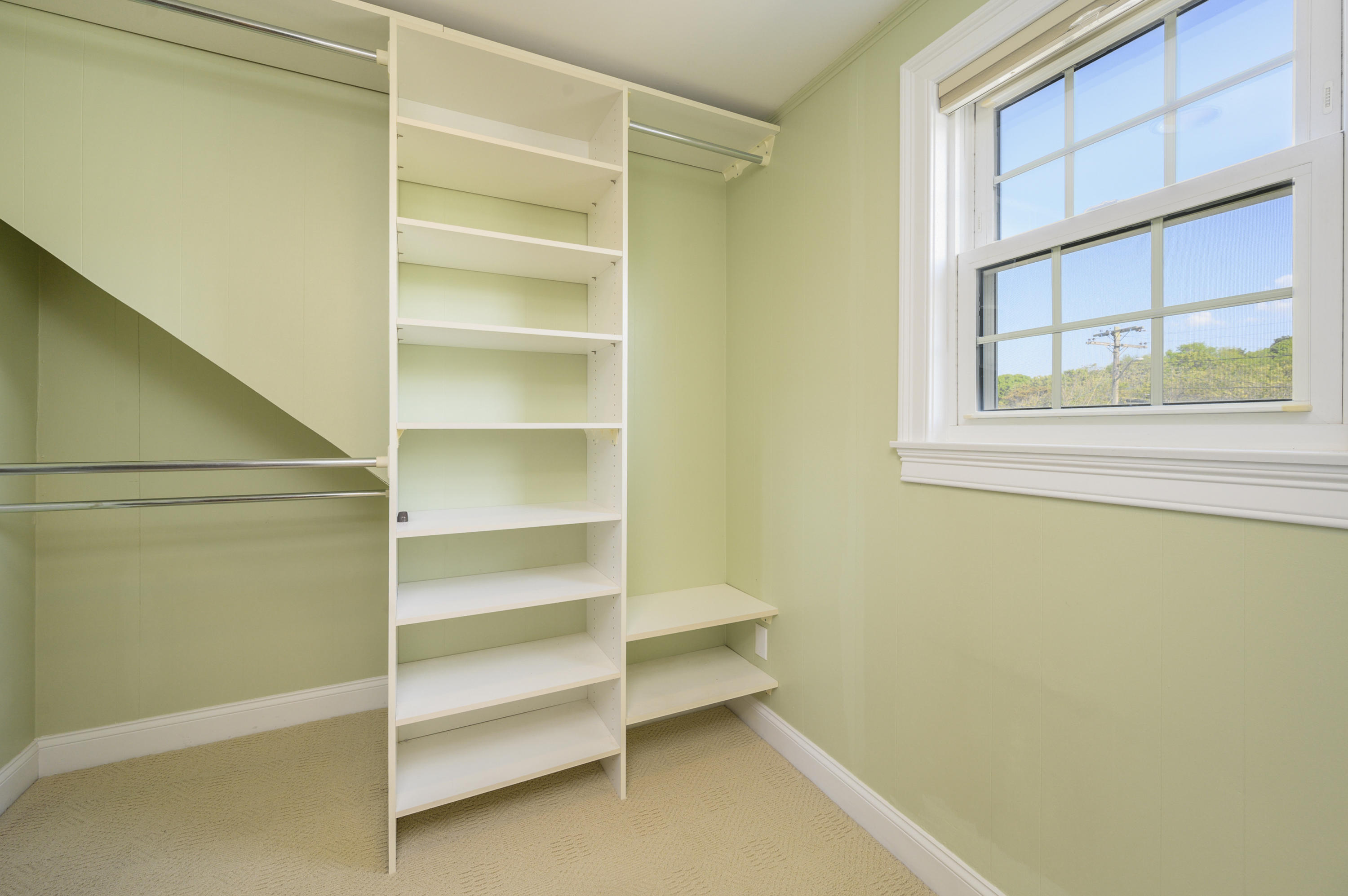 51 Captain Dunbar Road Brewster, MA 02631 - Photo 23 of 36 a view of walk in closet with empty racks