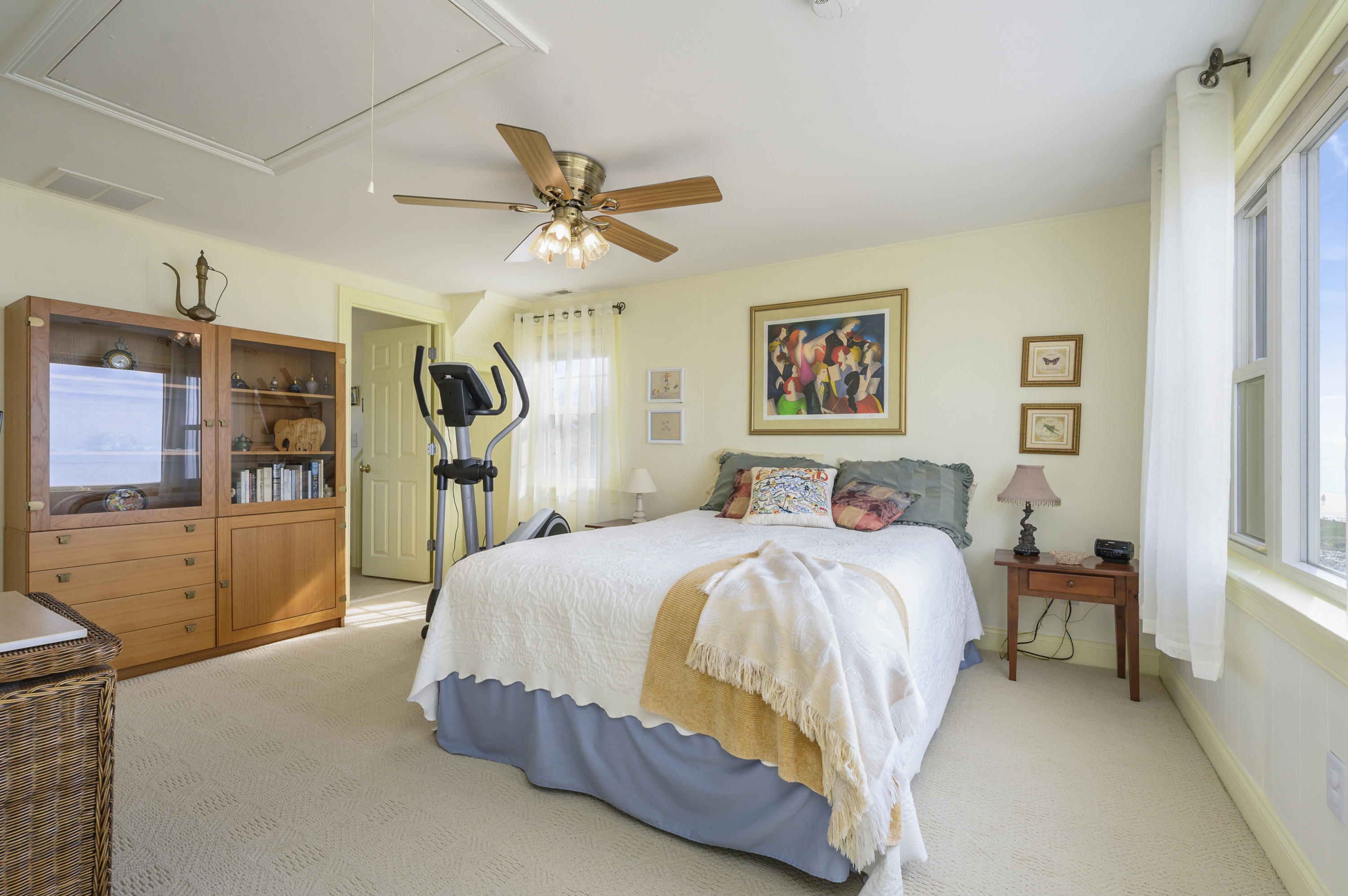 51 Captain Dunbar Road Brewster, MA 02631 - Photo 26 of 36 a spacious bedroom with a bed and a flat screen tv