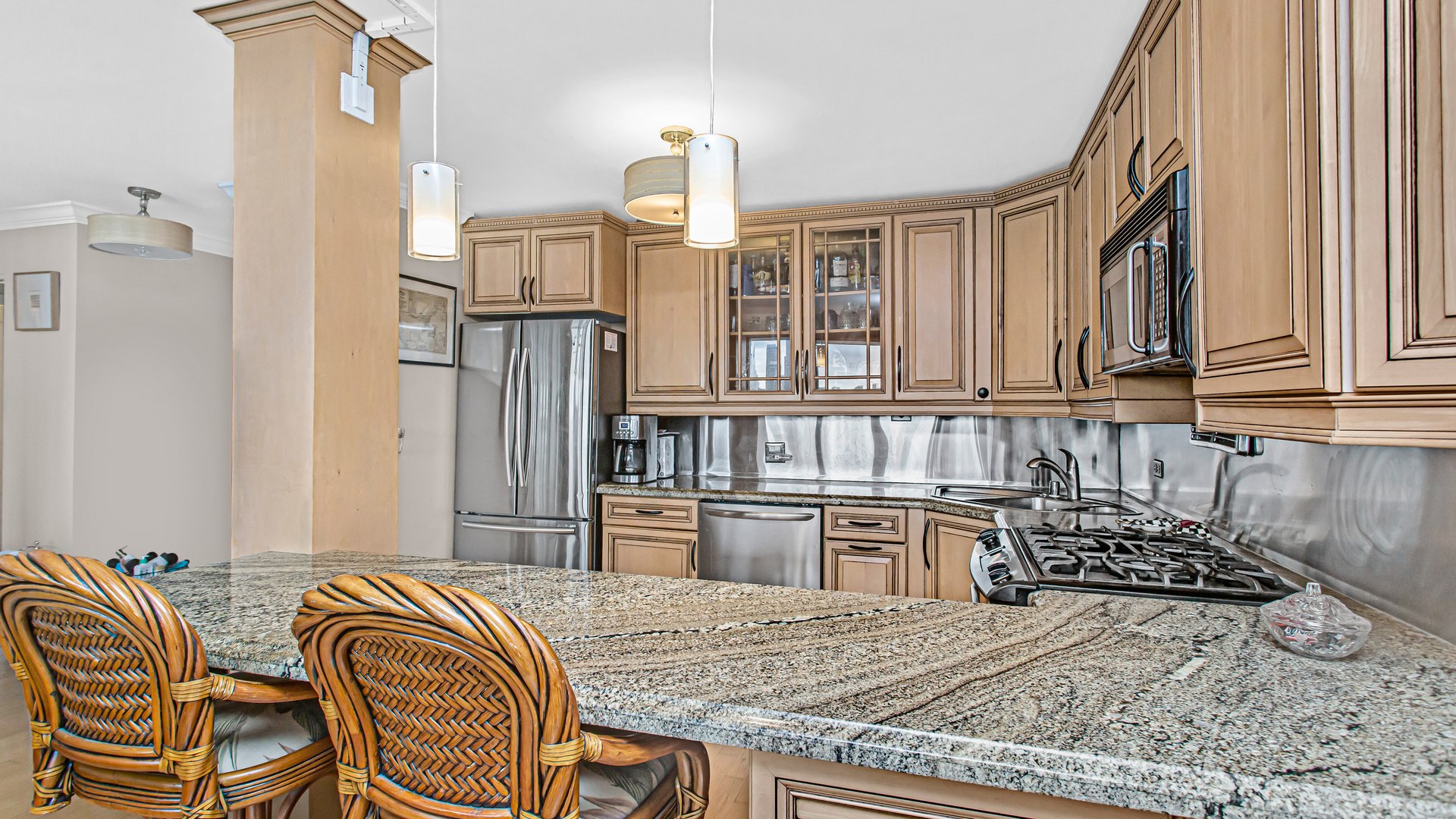 400 East Randolph Street, Unit 1915 Chicago, IL 60601 - Photo 11 of 25 a kitchen with a refrigerator and a stove top oven