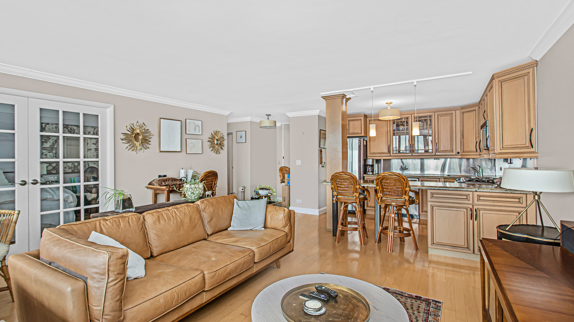 400 East Randolph Street, Unit 1915 Chicago, IL 60601 - Photo 8 of 25 a living room with furniture and a large window