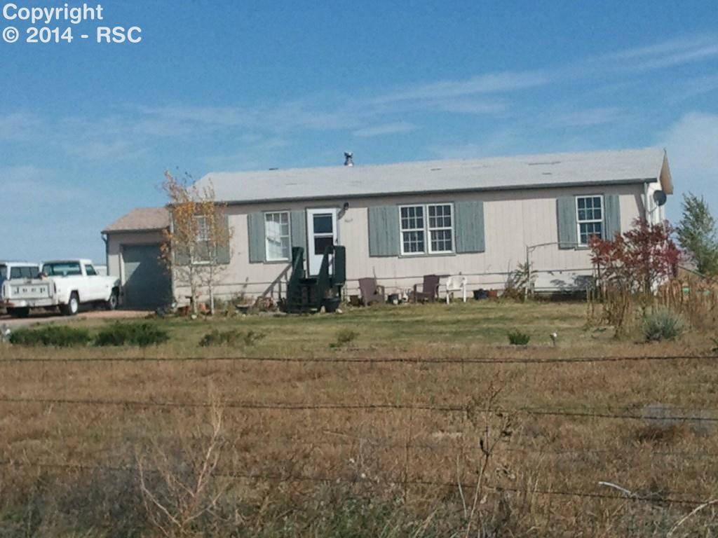 4665 North Log Road Peyton, CO 80831 - Photo 1 of 13