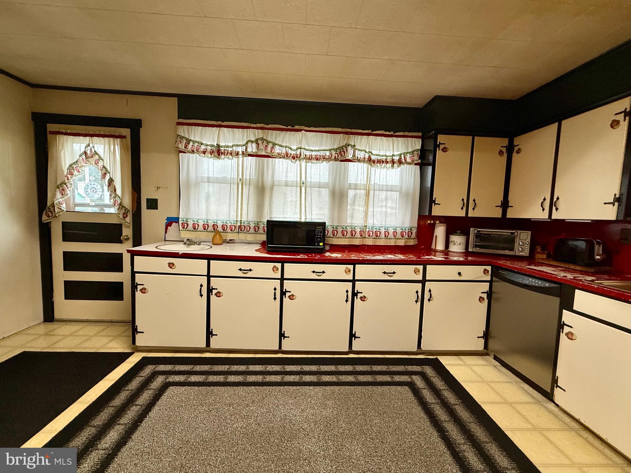 2837 Zion Road Bellefonte, PA 16823 - Photo 12 of 34 a room with table chairs and white walls