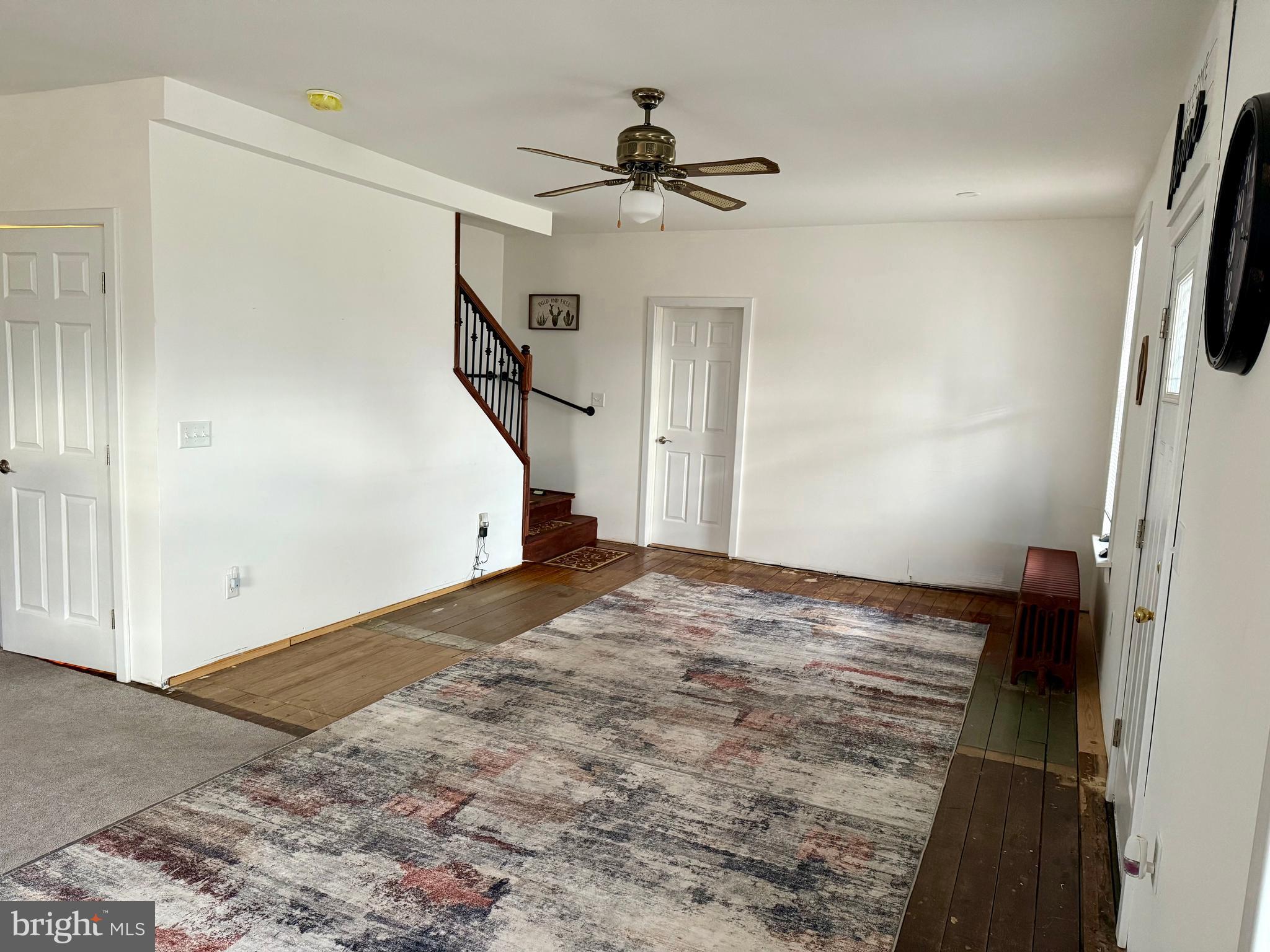 2837 Zion Road Bellefonte, PA 16823 - Photo 5 of 34 a view of empty room with wooden floor and fan
