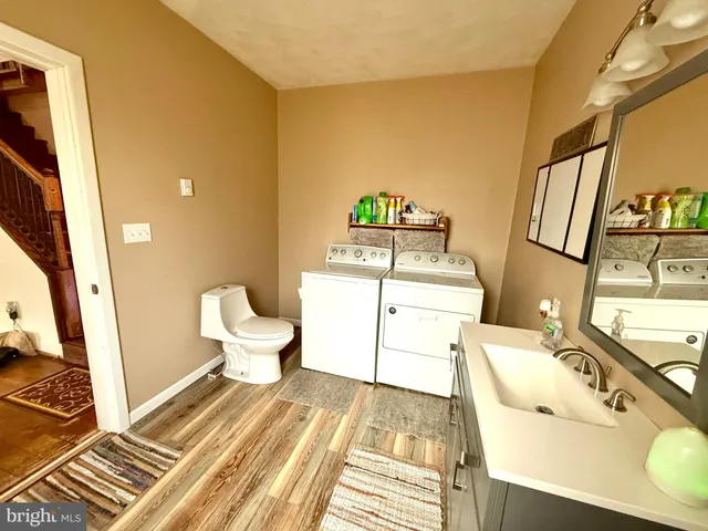 a bathroom with a sink and a toilet
