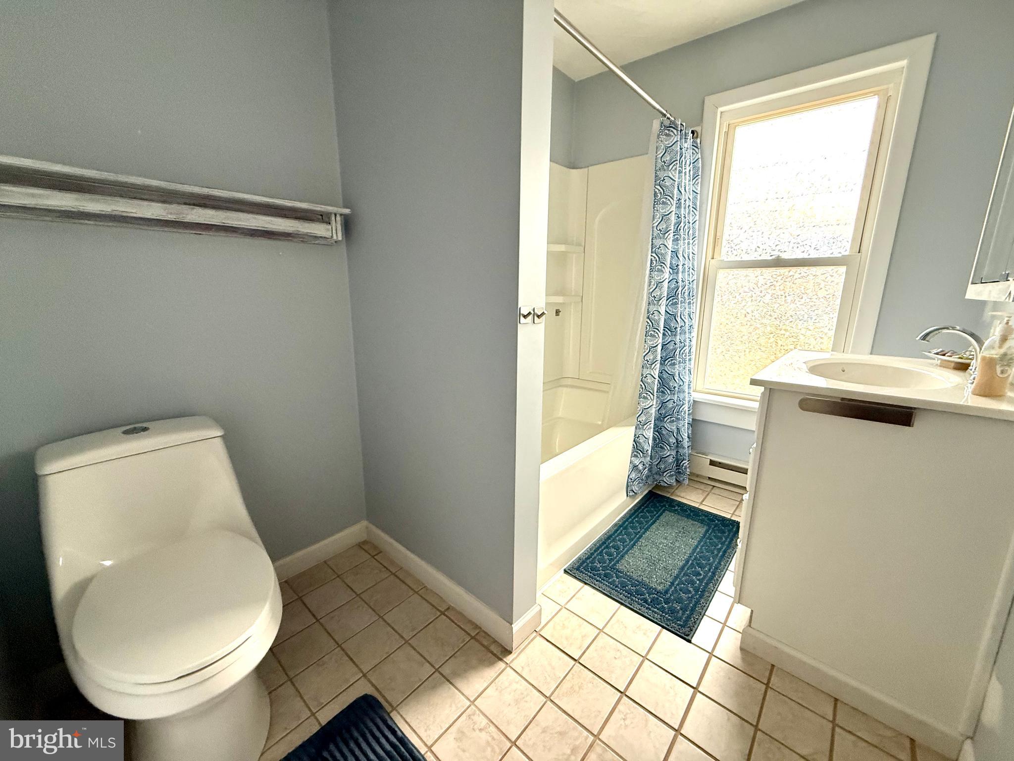 2837 Zion Road Bellefonte, PA 16823 - Photo 9 of 34 a bathroom with a sink toilet and shower