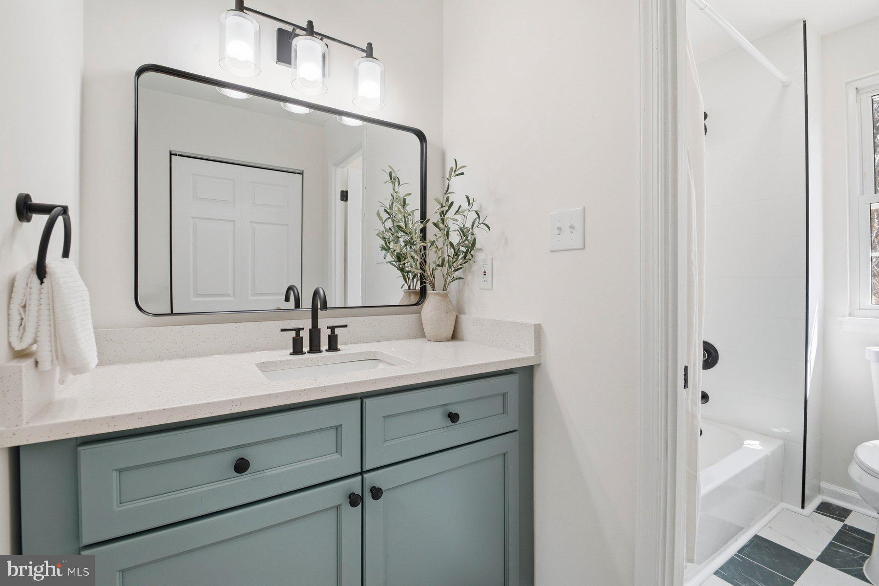 7 Prestwick Square Baltimore, MD 21228 - Photo 23 of 28 a bathroom with a sink and a mirror