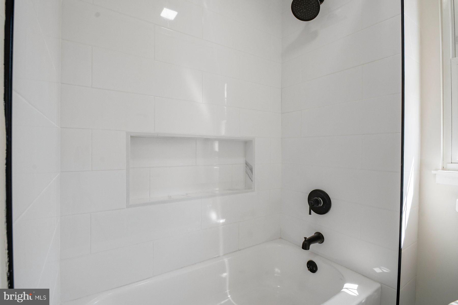 7 Prestwick Square Baltimore, MD 21228 - Photo 24 of 28 a bathroom with a shower