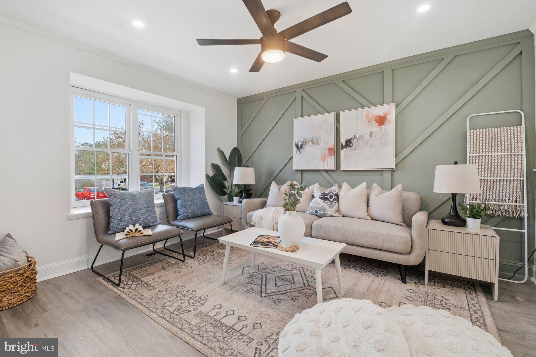 7 Prestwick Square Baltimore, MD 21228 - Photo 7 of 28 a living room with furniture and a large window