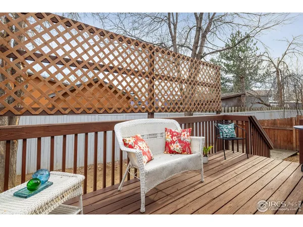 a view of deck with furniture and wooden floor