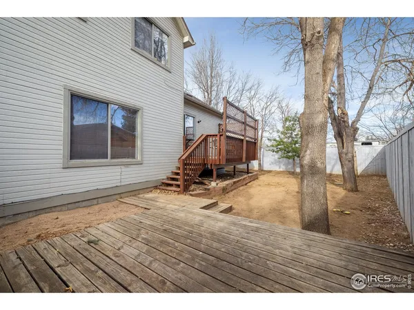 a view of outdoor space with wooden floor