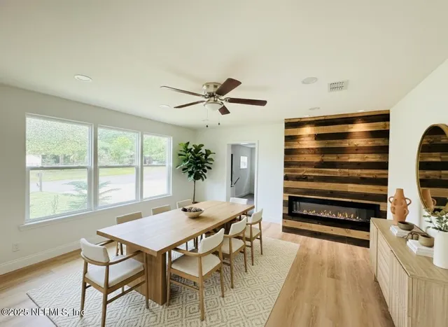 a view of a livingroom with furniture and a table