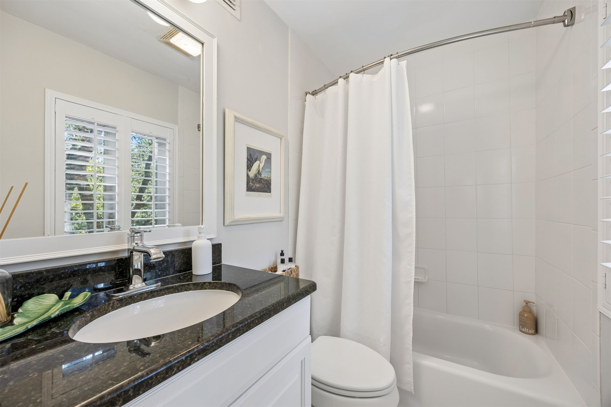 2005 Beachwood Road, Unit 2005 Amelia Island, FL 32034 - Photo 25 of 43 a bathroom with a granite countertop sink toilet and shower