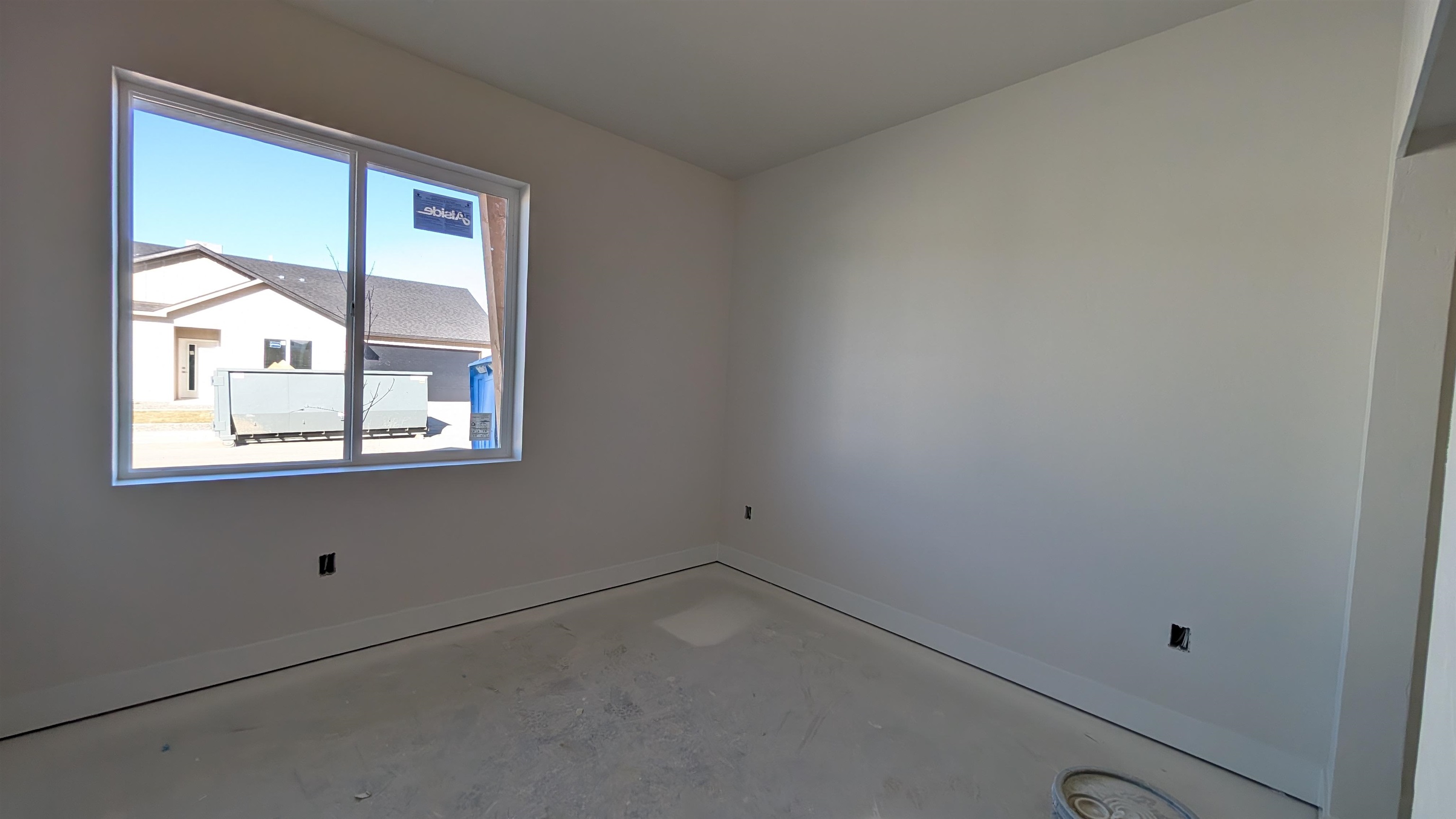2461 Revere Road, Unit A Grand Junction, CO 81505 - Photo 6 of 15 an empty room with a window