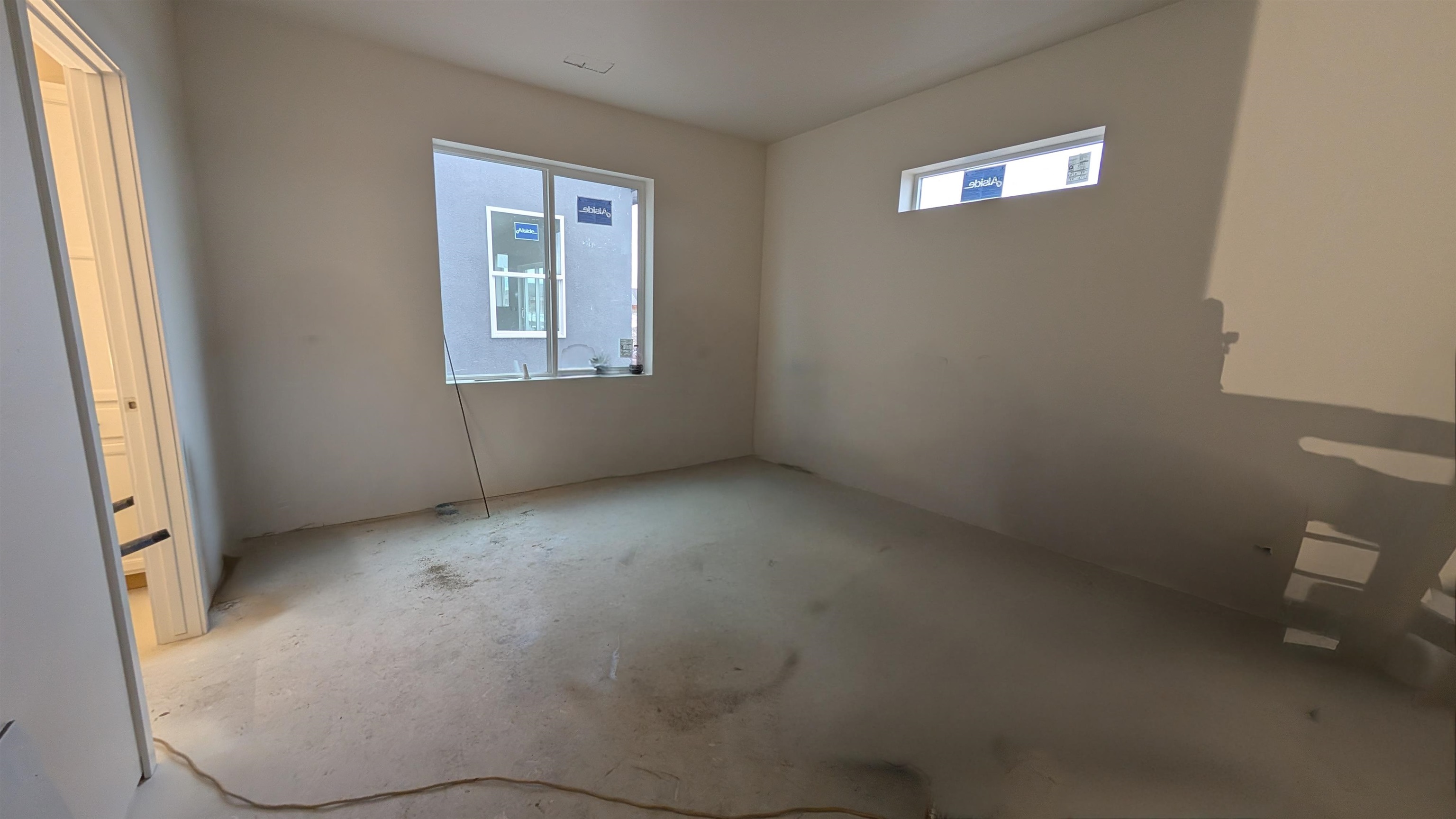 2461 Revere Road, Unit A Grand Junction, CO 81505 - Photo 8 of 15 a view of an empty room with a window
