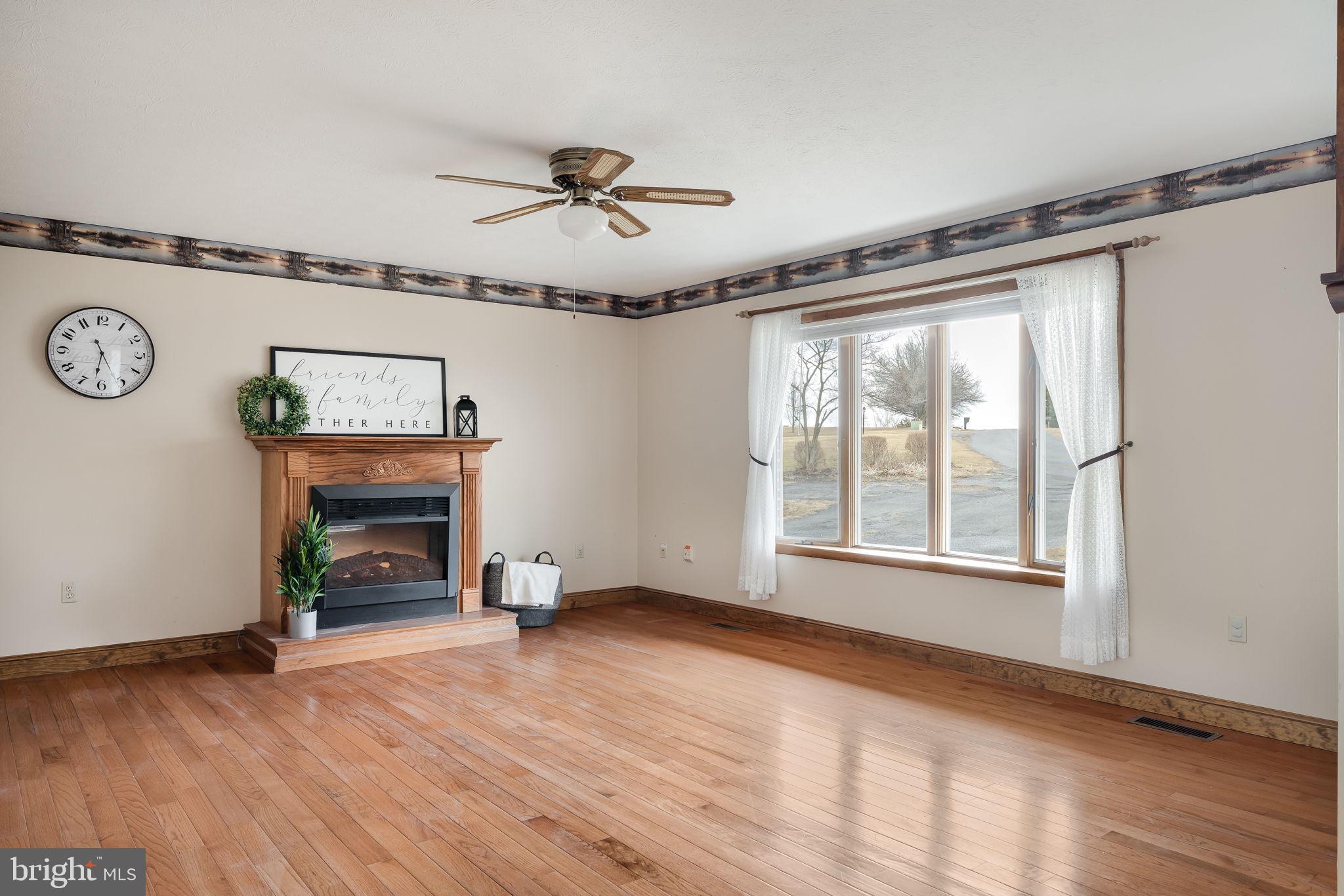 468 Hillcrest Road Edinburg, VA 22824 - Photo 3 of 32 Beautiful bay window in living room