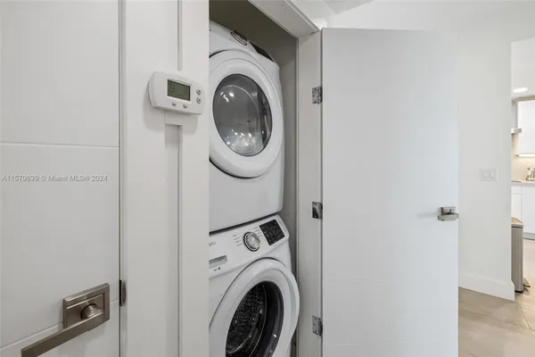 a view of a chairs and table in a patio